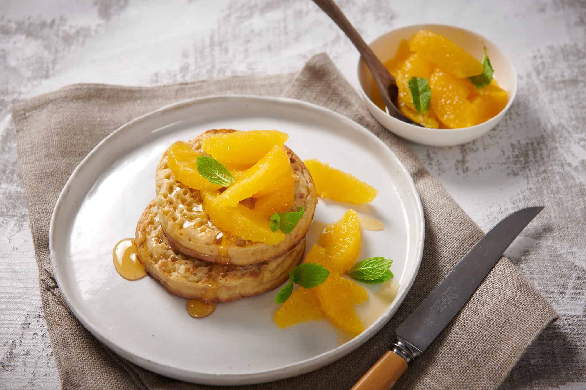 honeyed-orange-crumpet-rounds-with-mint Honeyed Orange Crumpet Rounds with Mint